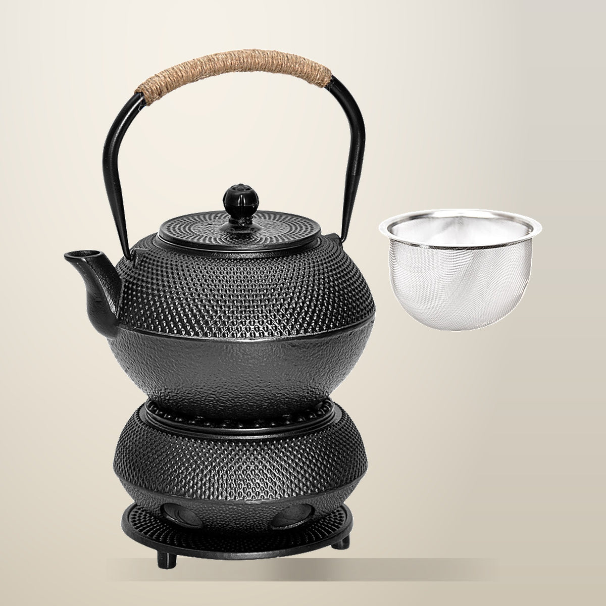 Alston 1.2 L Cast Iron Teapot and Warmer Set, on a plain cream background