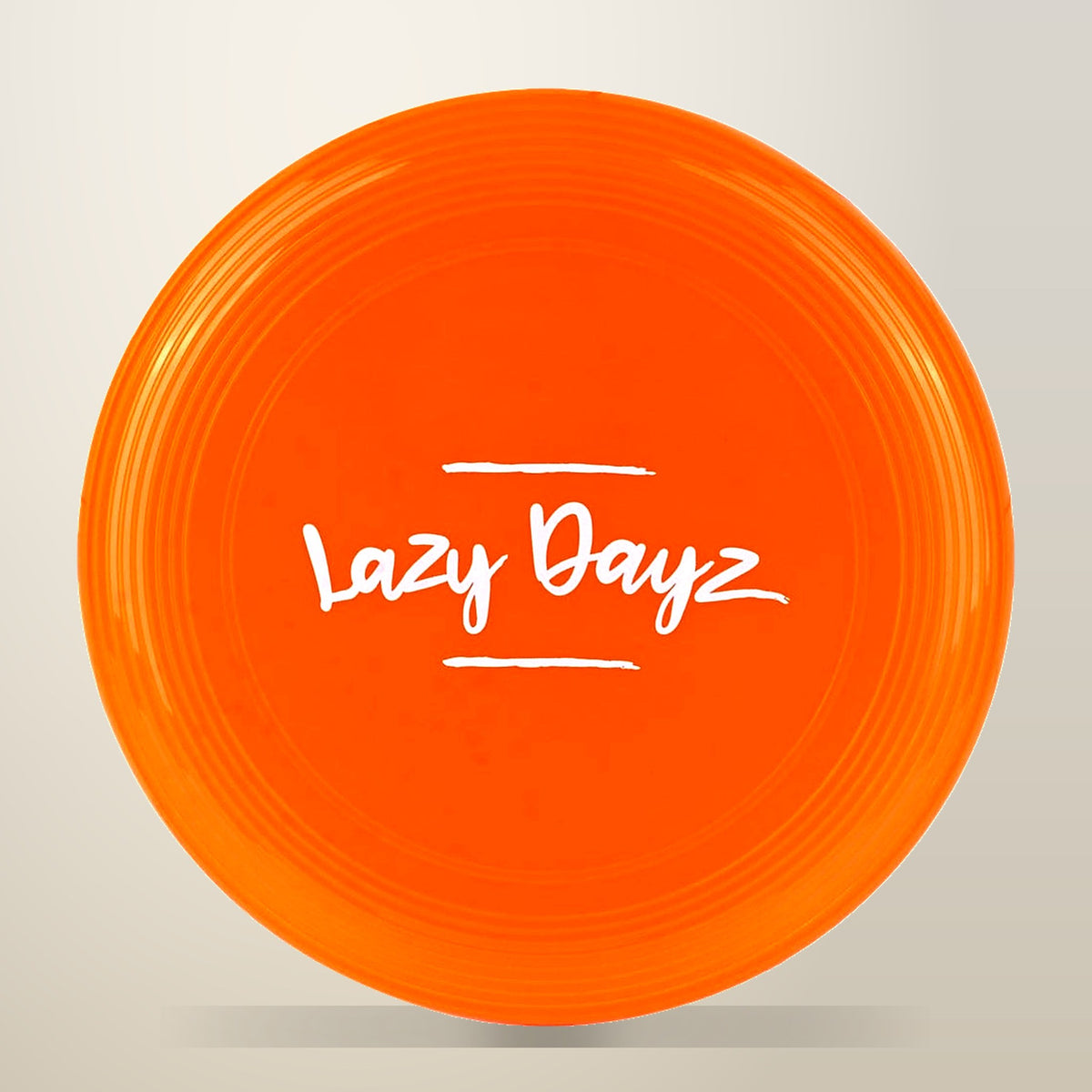 28 cm Jumbo Neon Beach Frisbee, Orange, on a plain cream background