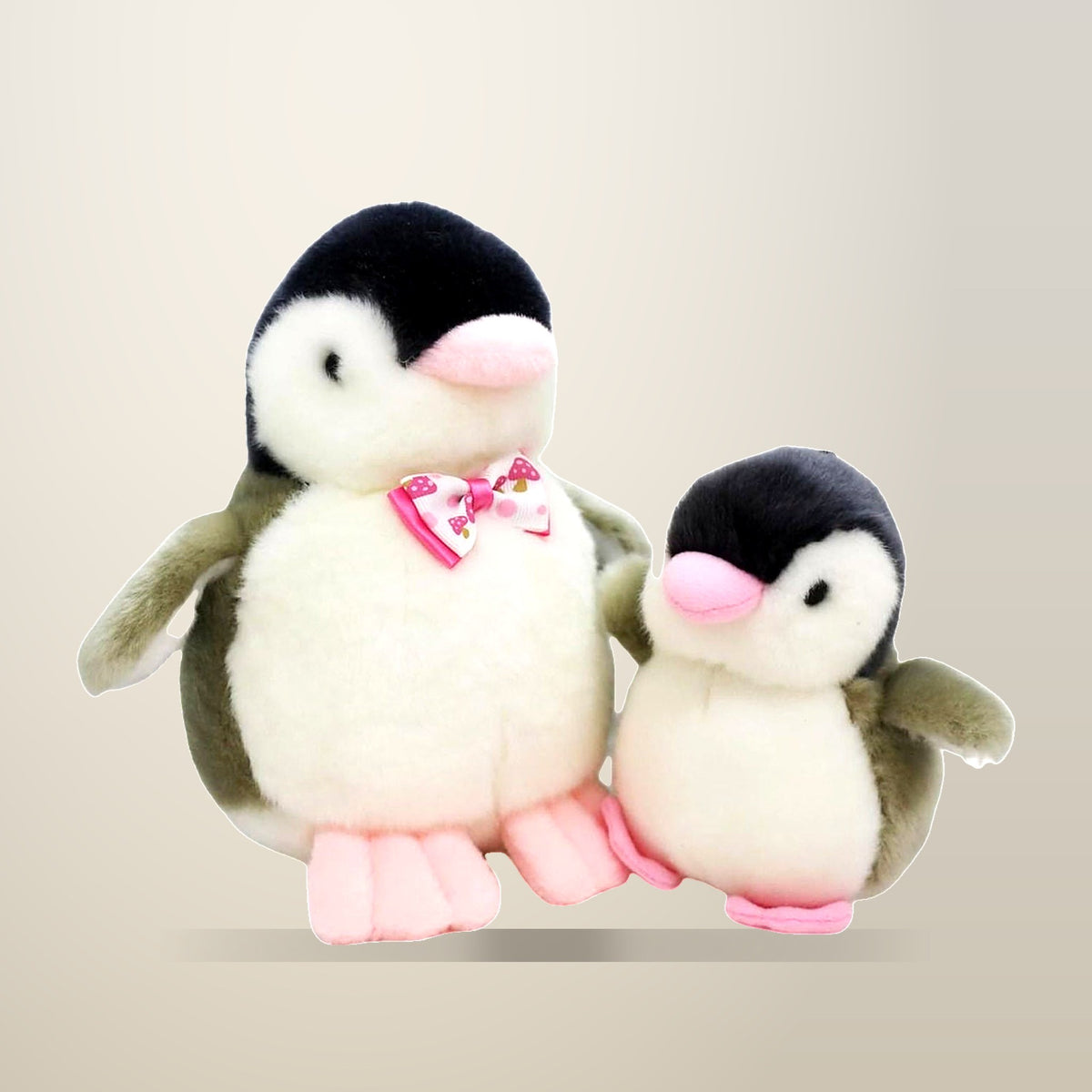 Kenisy Plush Penguin Keychain and Doll Set, Grey, 2 Piece, on a plain cream background