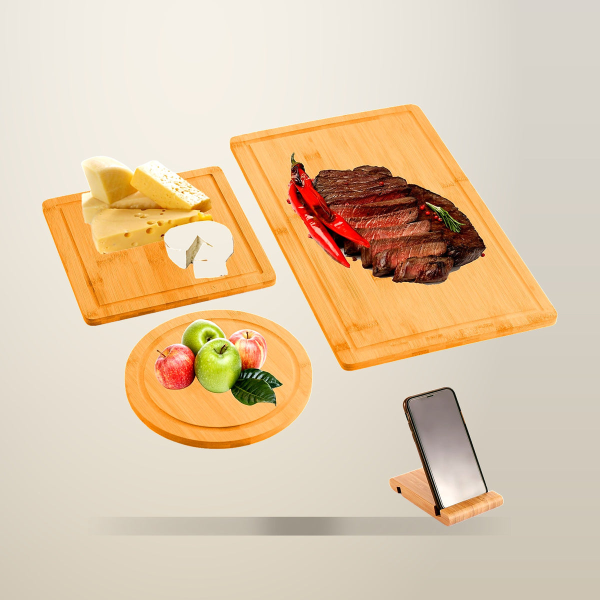 CARLA HOME 3 Piece Bamboo Cutting Board Set with Phone Holder, on a plain cream background