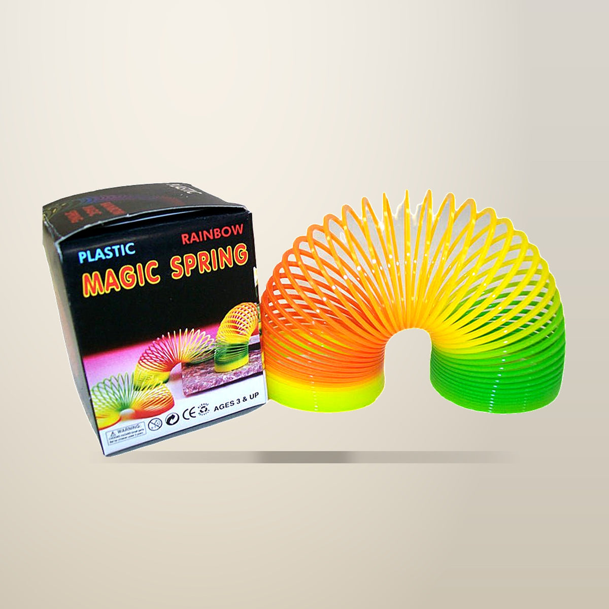 Rainbow Spring Toy, Plastic, Set of 4, on a plain cream background