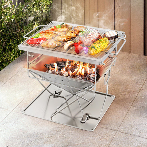 Grillz Folding Fire Pit BBQ with Carry Bag, shown in a real setting