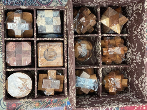 12 Puzzle Brain teaser interlocking wooden Puzzle set in a Deluxe