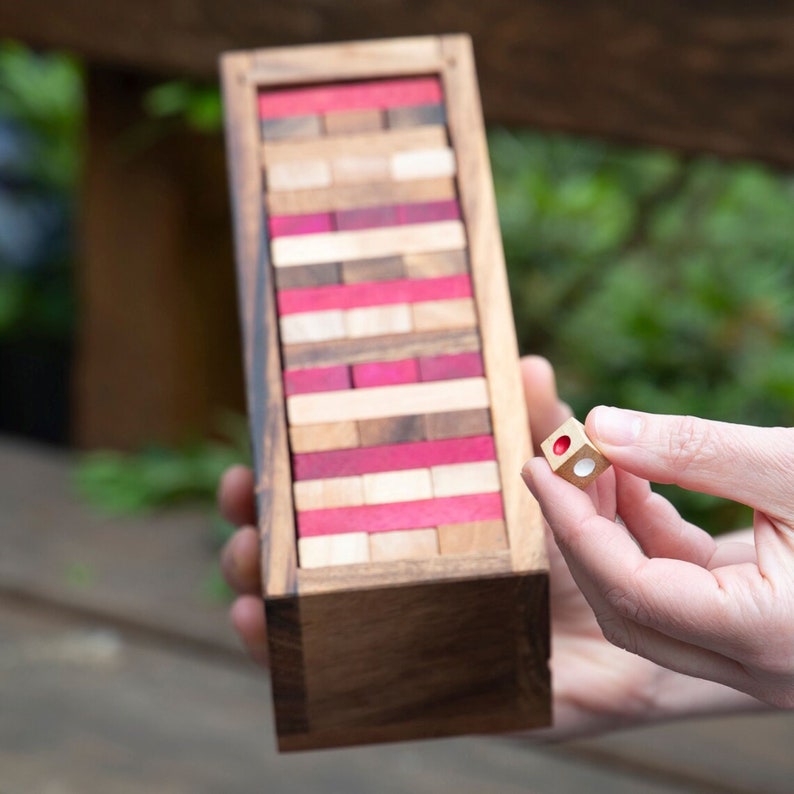 Stacking tumbling blocks wood Red colours balance game