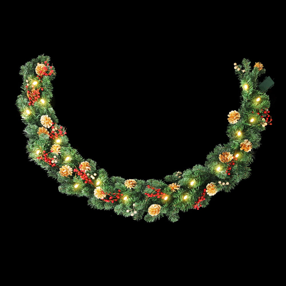 Jingle Jollys 1.8 m Garland with Pine Cones and Berries, lit up in the dark