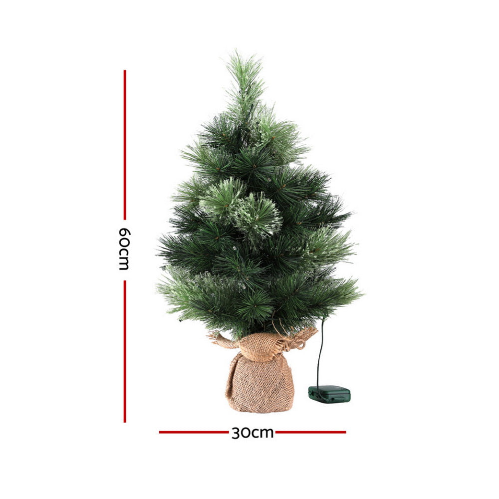 Jingle Jollys Battery Lit Tabletop Christmas Tree, 60 cm, shown in a real setting