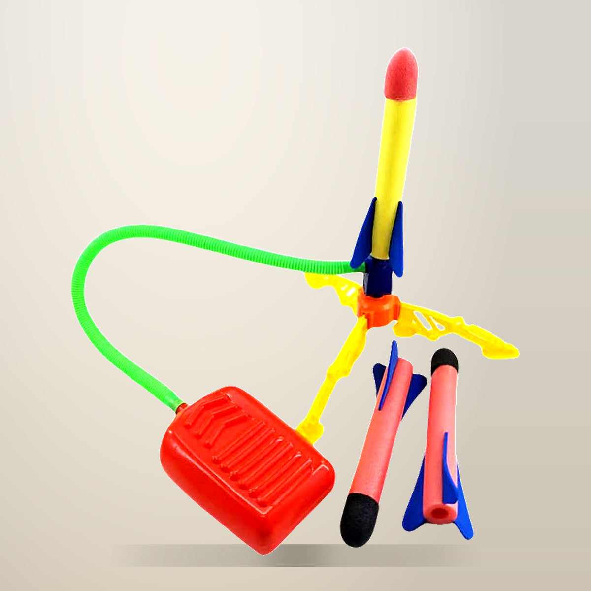 Foam Rocket Stomp Launcher, Single Pump, 3 Rockets, on a plain cream background