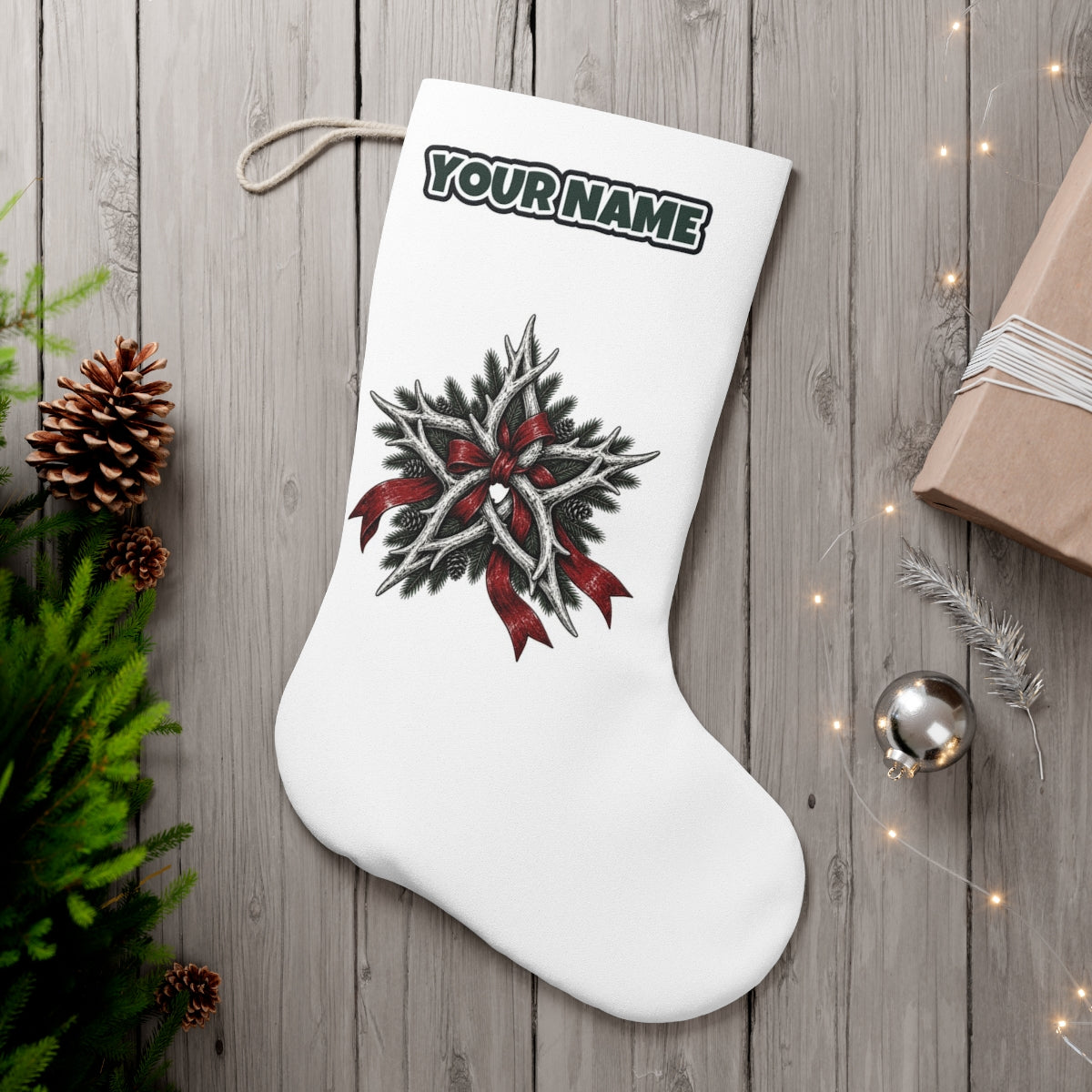 Antler Star With Ribbon personalised Christmas stocking, white, with the name across the top