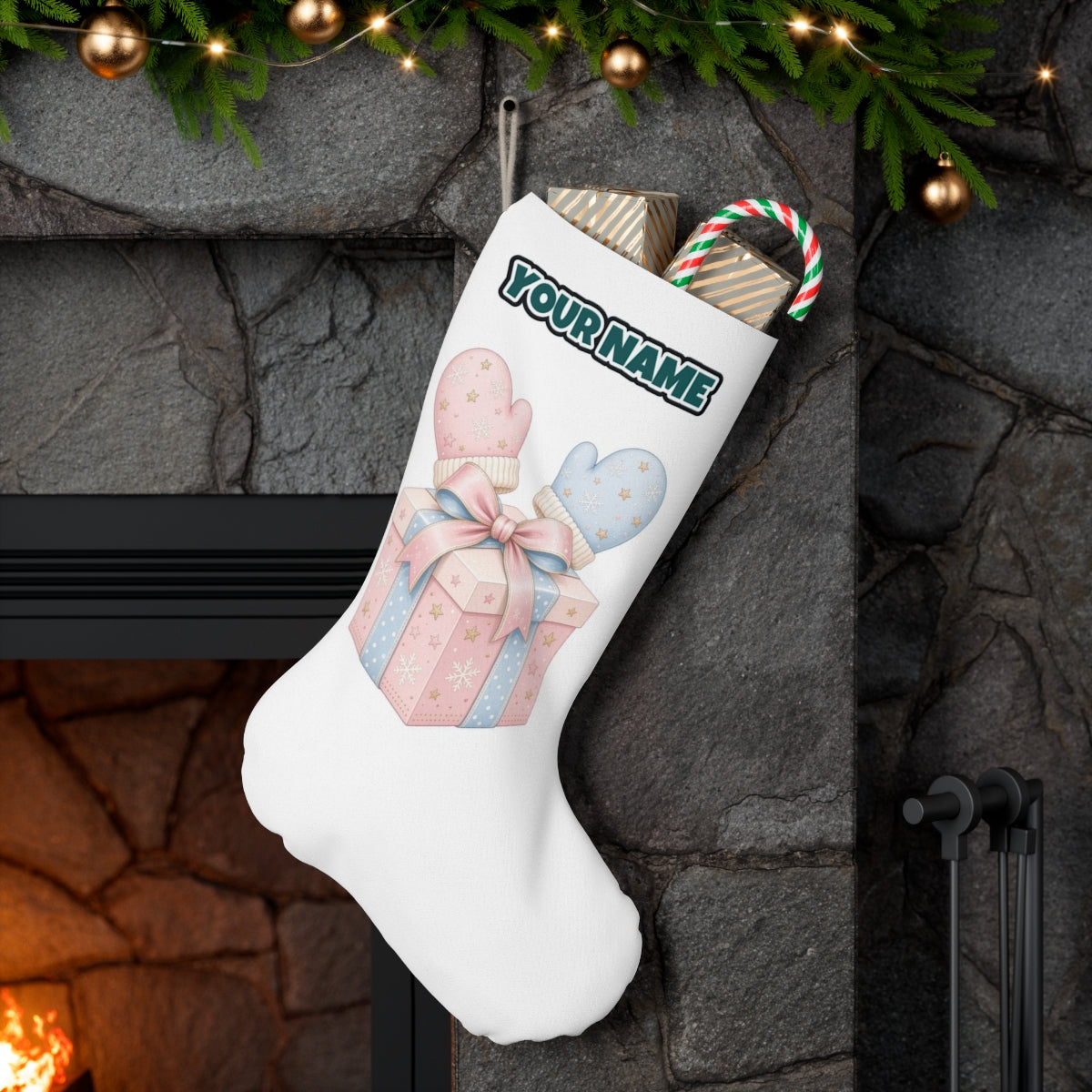 Baby Mittens Gift Box personalised Christmas stocking hanging on a mantel
