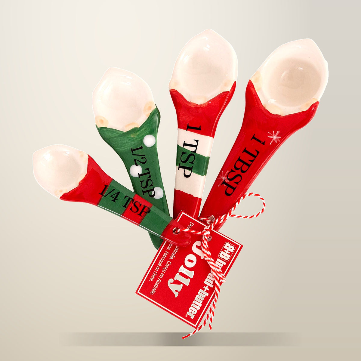 Bread and Butter Gnome Measuring Spoons, 4 Pack, on a plain cream background