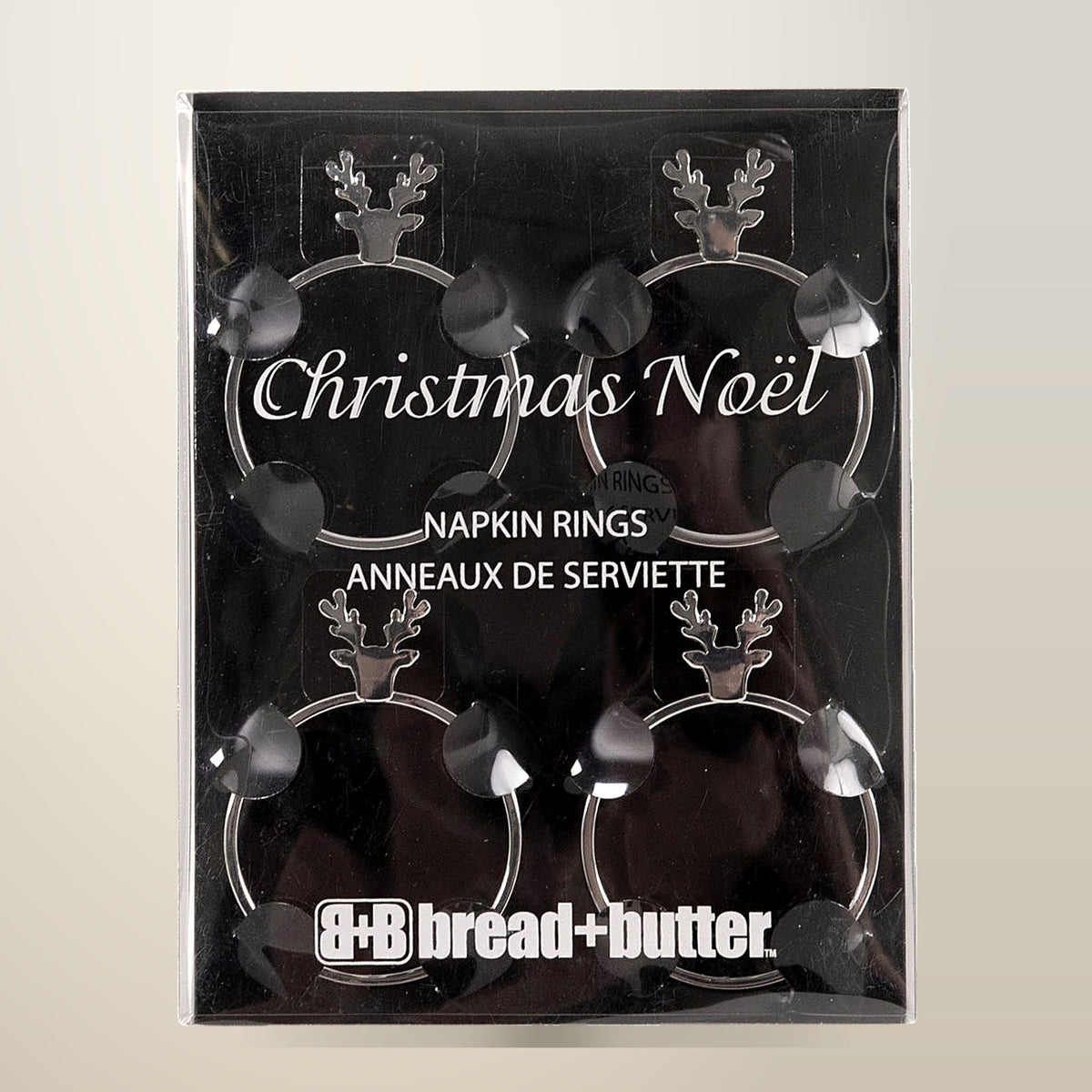 Bread and Butter Stag Head Napkin Rings, 4 Pack, on a plain cream background
