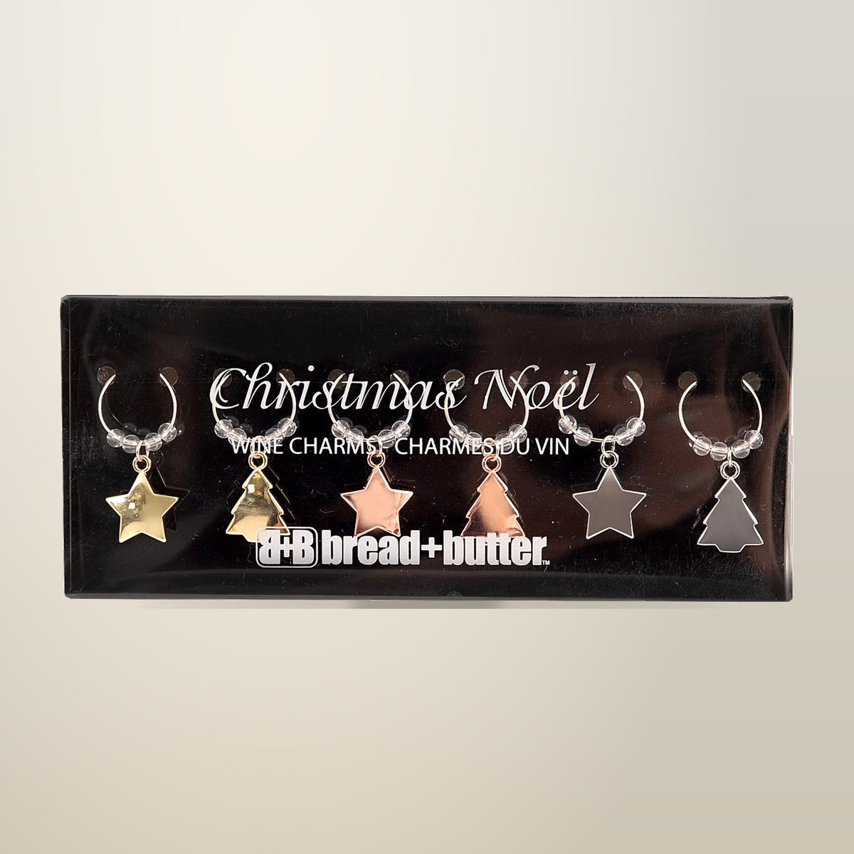 Bread and Butter Star and Tree Wine Glass Charms, Pack of 6, on a plain cream background