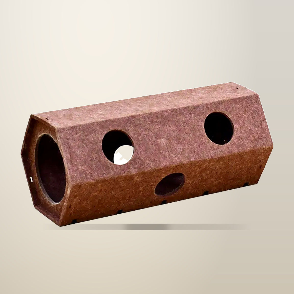 Brown Hexagonal Cat Tunnel, 60 x 26 x 26 cm, on a plain cream background
