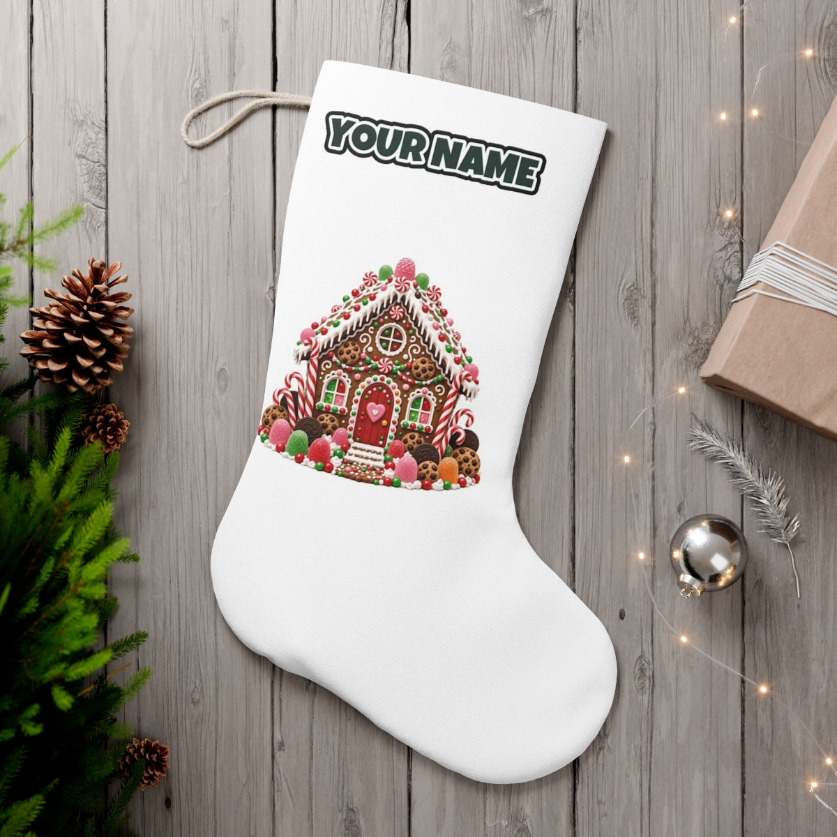 Cookie and Gumdrop Gingerbread House personalised Christmas stocking, white, with the name across the top
