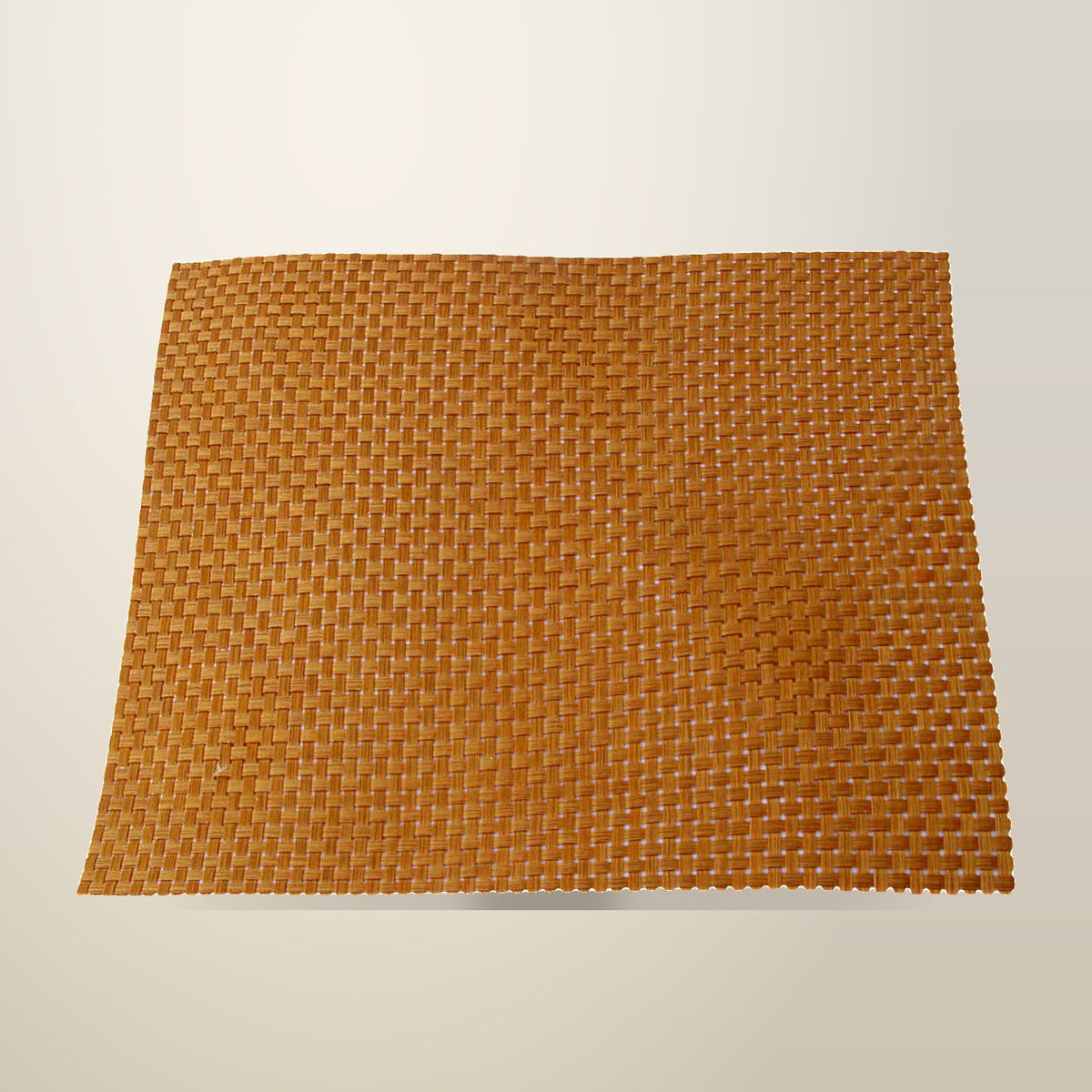 Choice 4 Piece Woven Placemats, Royal Gold, 30 x 40 cm, on a plain cream background