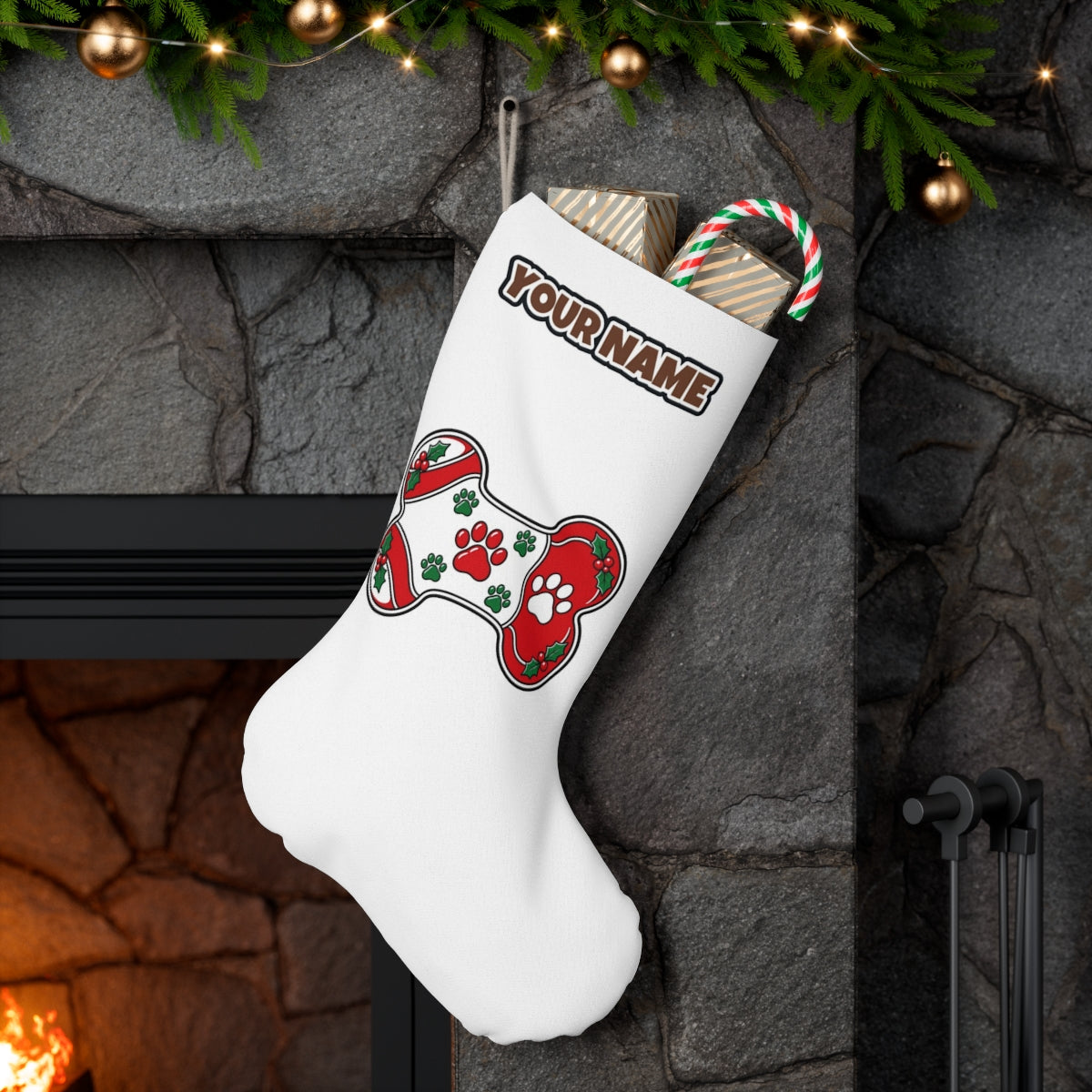 Christmas Dog Bone Paw Prints personalised Christmas stocking hanging on a mantel