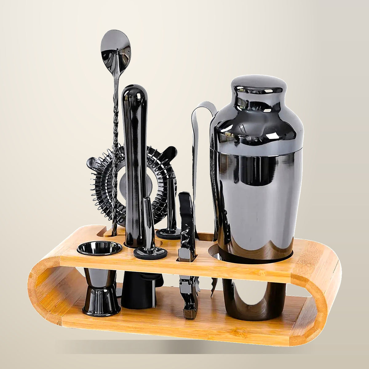 Stainless Steel Cocktail Shaker Set, on a plain cream background