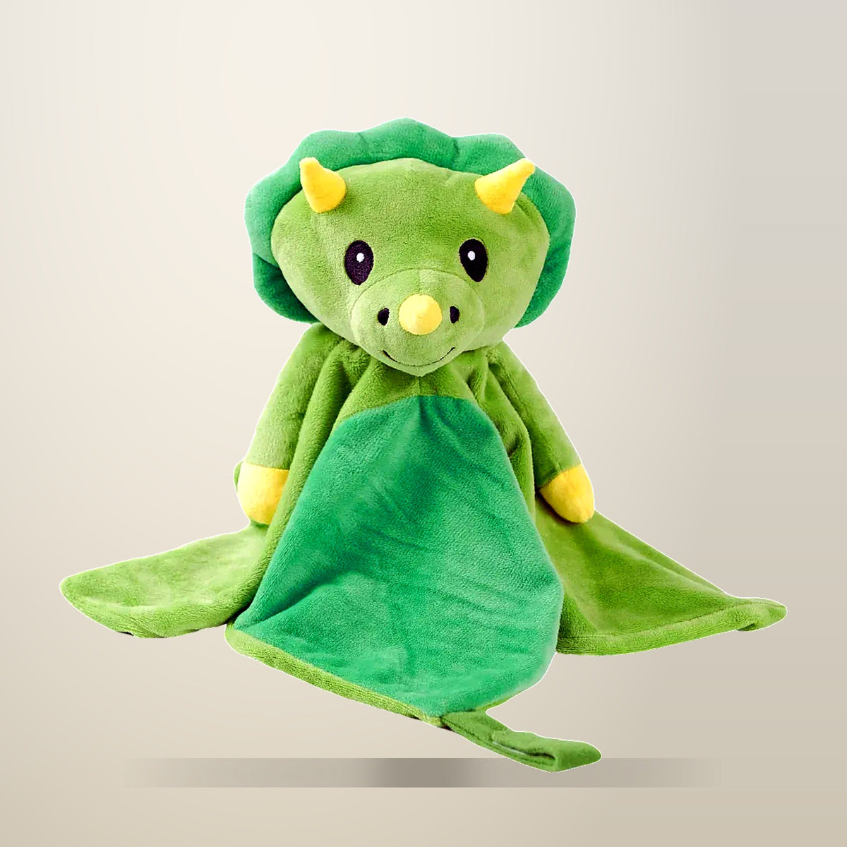 Dash the Dinosaur Musical Lovey, on a plain cream background