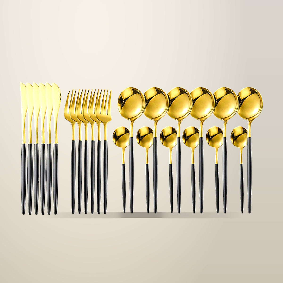 Deluxe 24 Piece Cutlery Set, Black with Gold or Silver, on a plain cream background