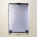 Flightmode Medium Aluminium Suitcase, Silver, 60 L, on a plain cream background