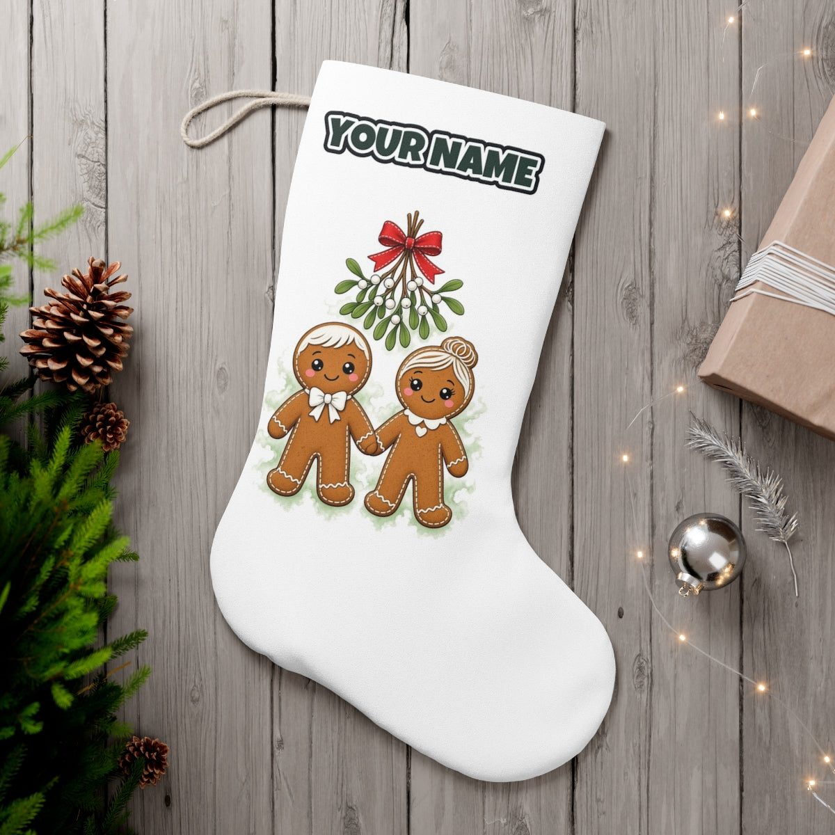 Gingerbread Couple Under Mistletoe personalised Christmas stocking, white, with the name across the top