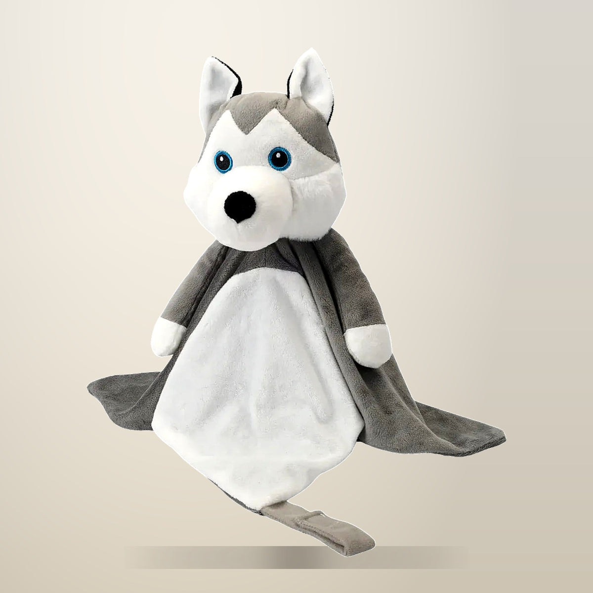 Love By Emi Harli the Husky Comforter Toy, on a plain cream background