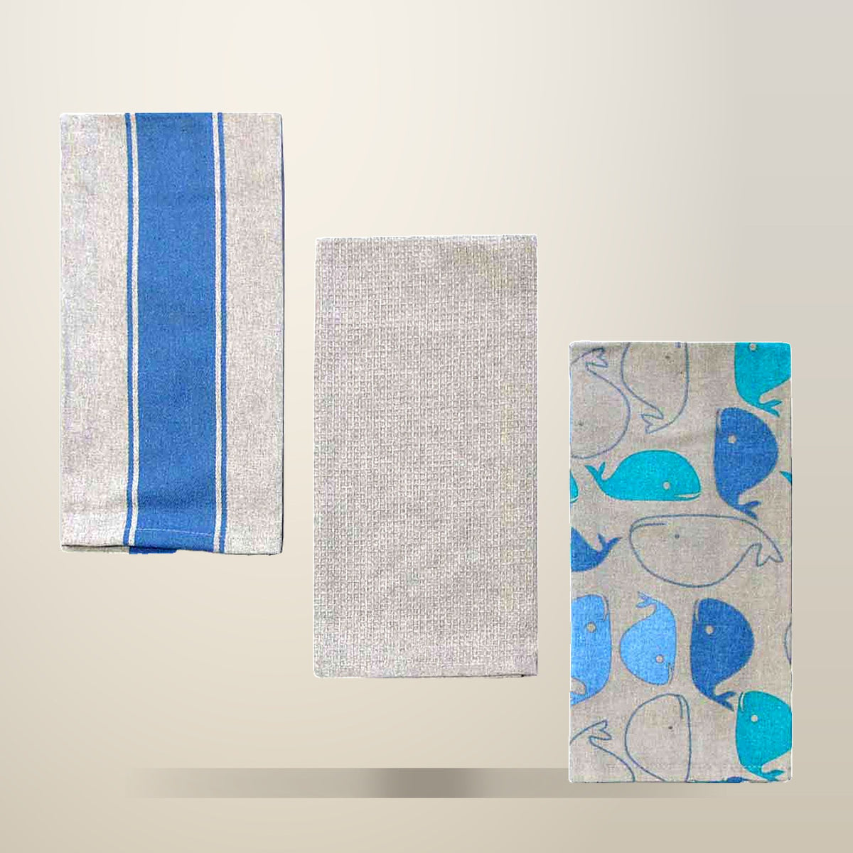 Home Oasis Set of 3 Cotton Tea Towels, 50 x 70 cm, on a plain cream background