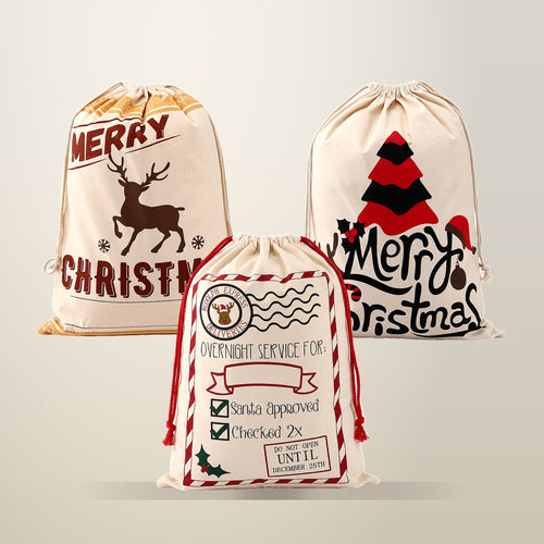 Jingle Jollys Large Canvas Christmas Sacks, 3 Pack, on a plain cream background