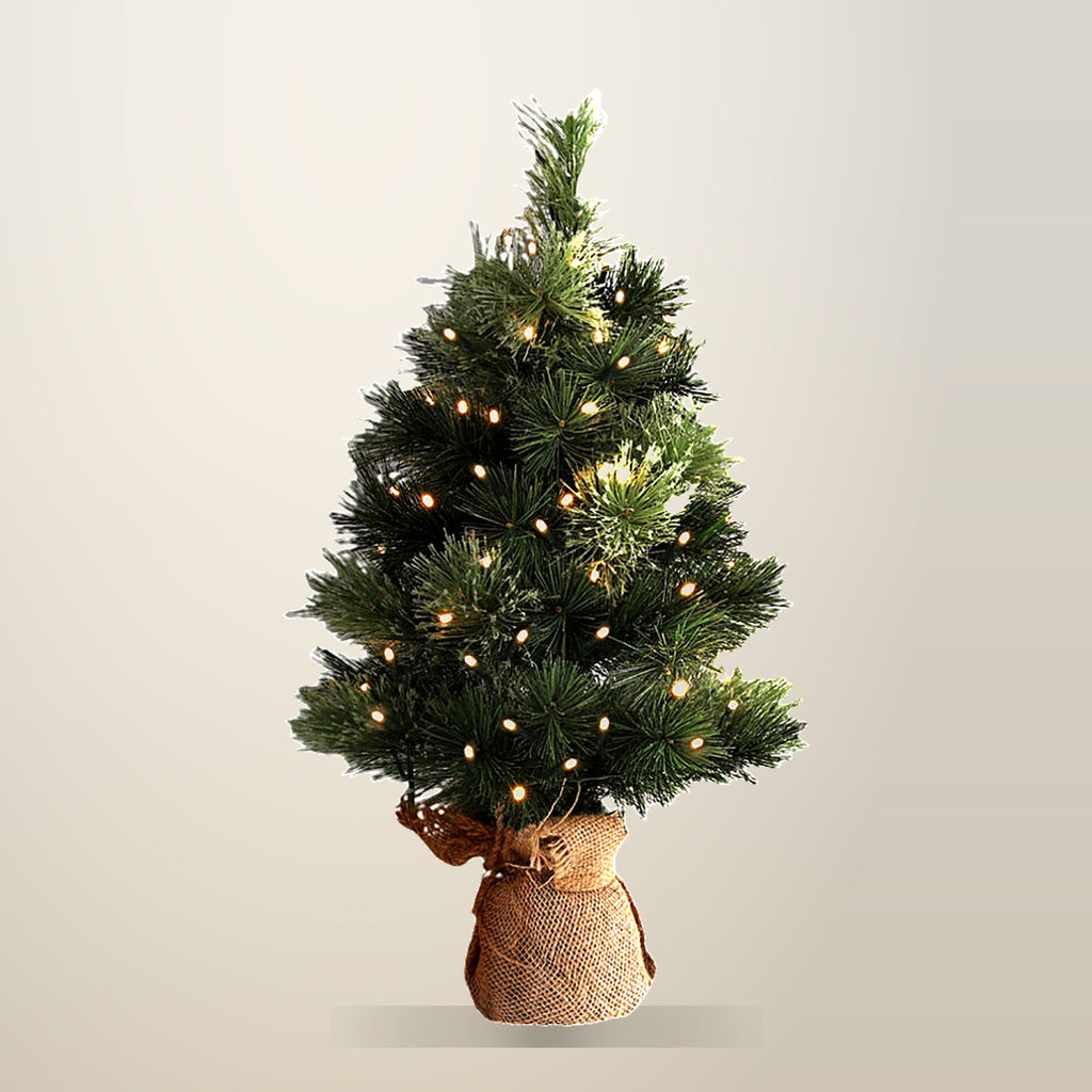 Jingle Jollys Battery Lit Tabletop Christmas Tree, 60 cm, on a plain cream background