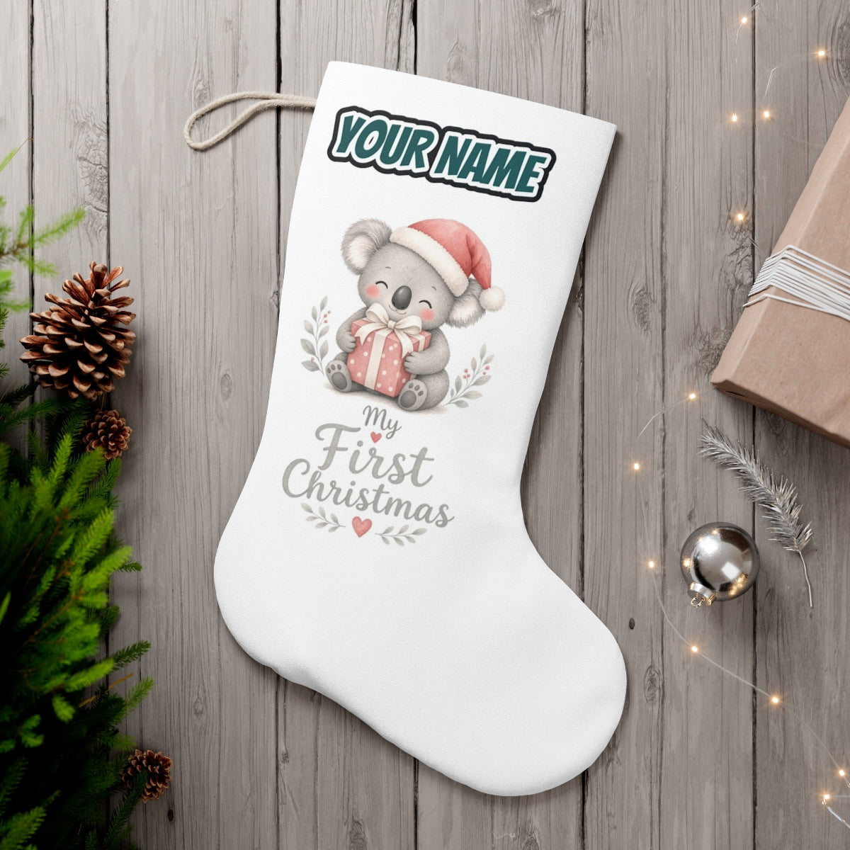 Koala's First Christmas personalised Christmas stocking, white, with the name across the top