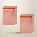 Ladelle Culinary Jumbo Kitchen Towels, Terracotta, on a plain cream background