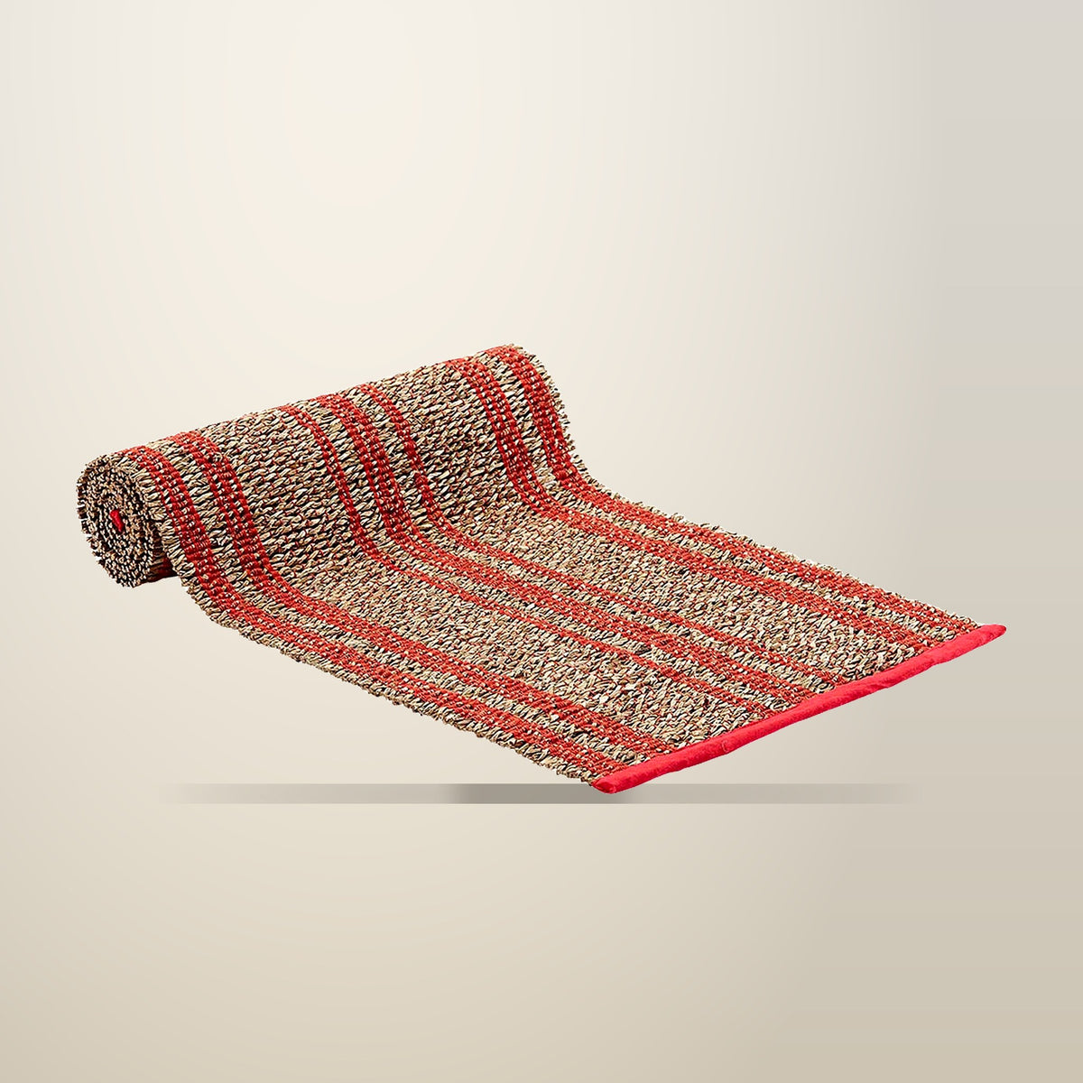 Ladelle Loma Woven Table Runner, Terracotta, on a plain cream background