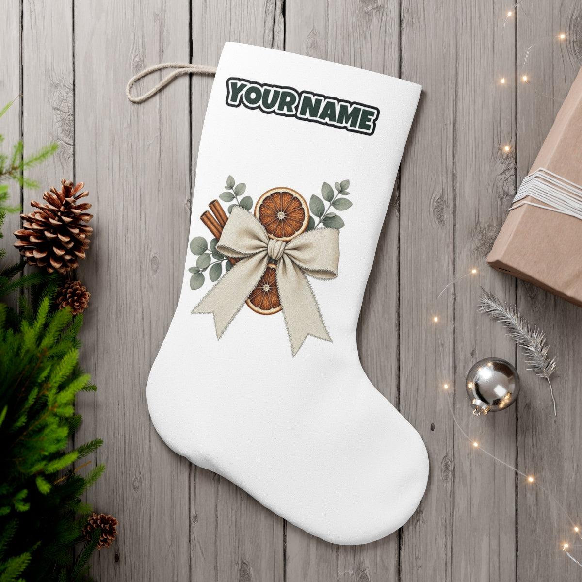 Linen Bow With Dried Orange personalised Christmas stocking, white, with the name across the top