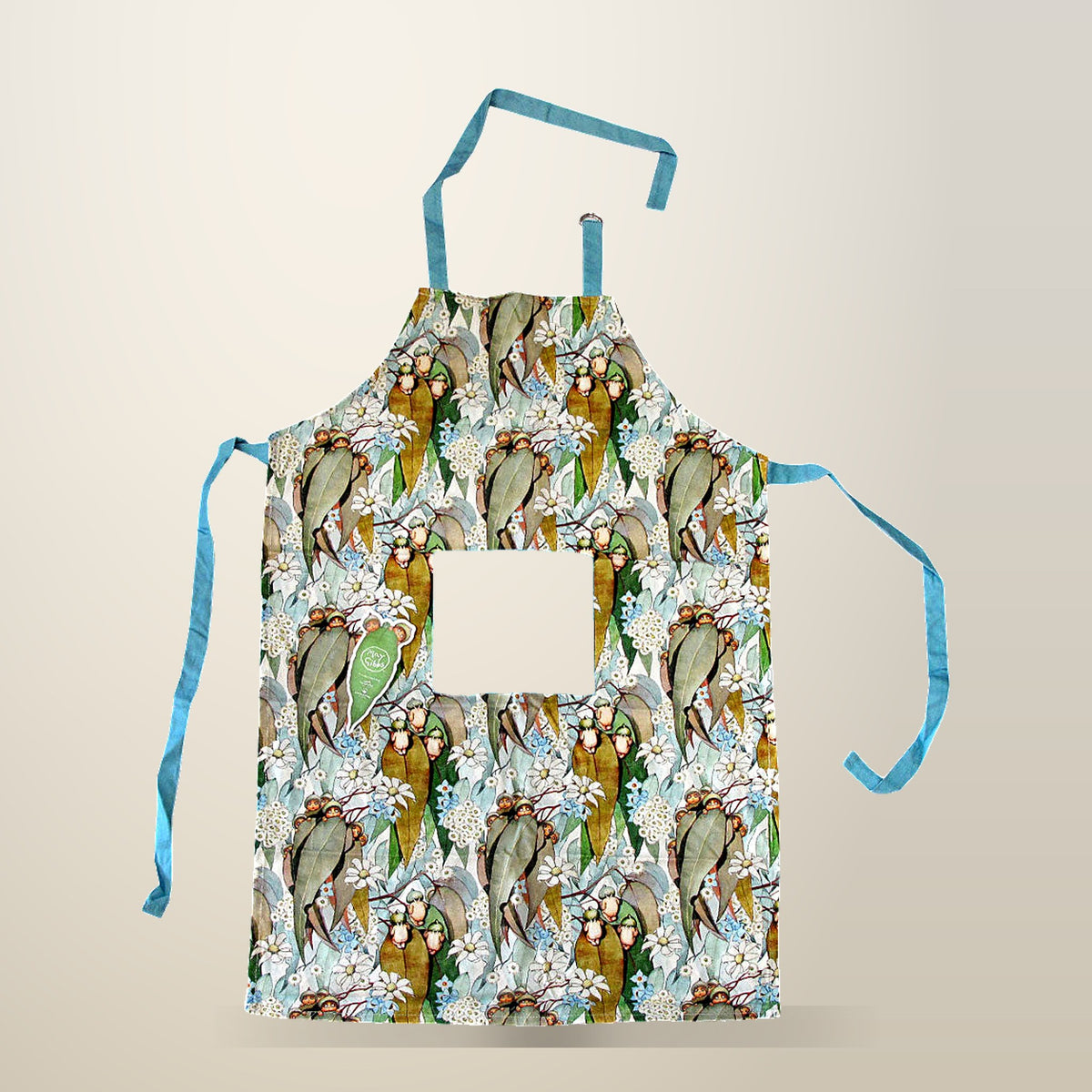 May Gibbs Gumnut Baby Cotton Apron, 60 x 85 cm, on a plain cream background