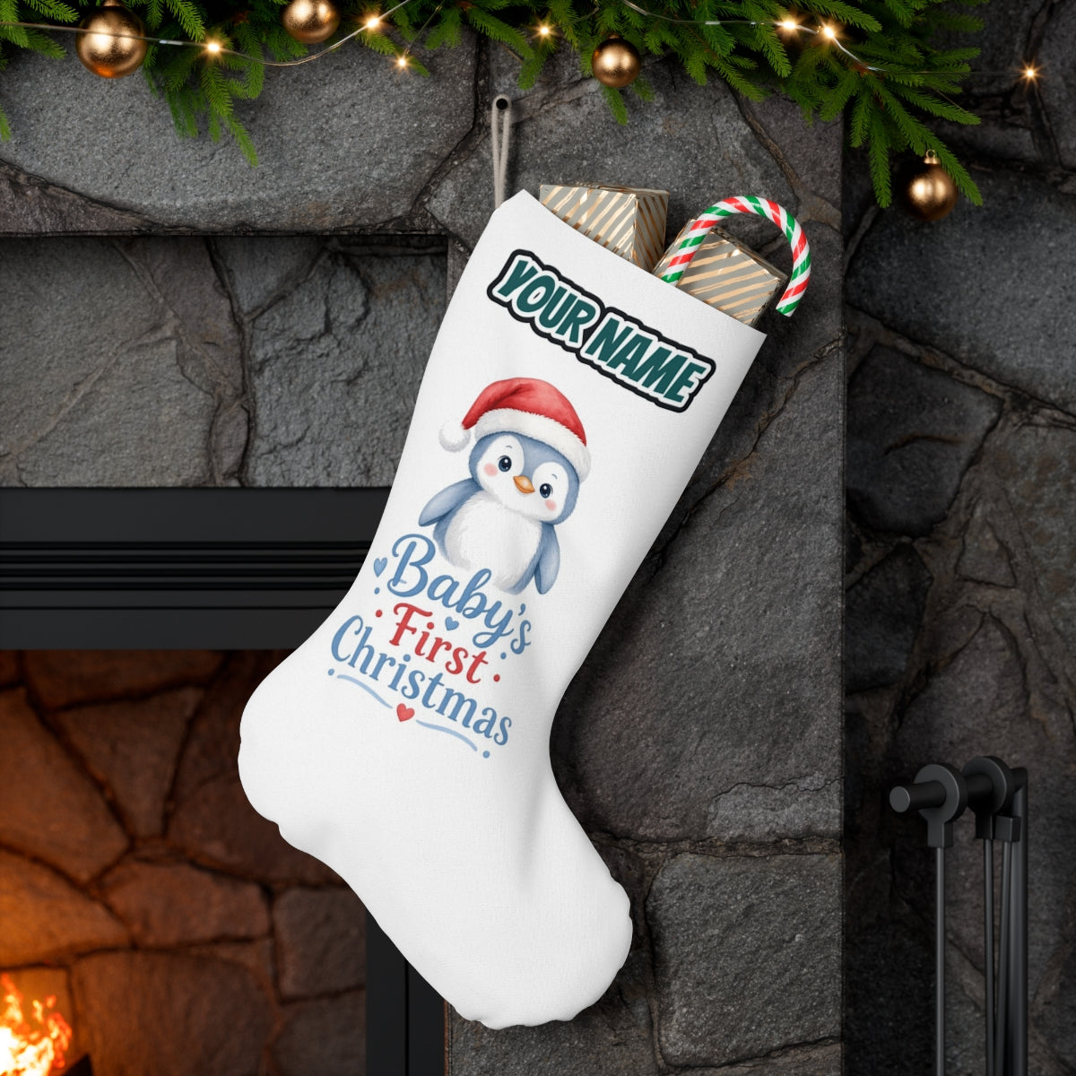 Penguin Baby's First Christmas personalised Christmas stocking hanging on a mantel