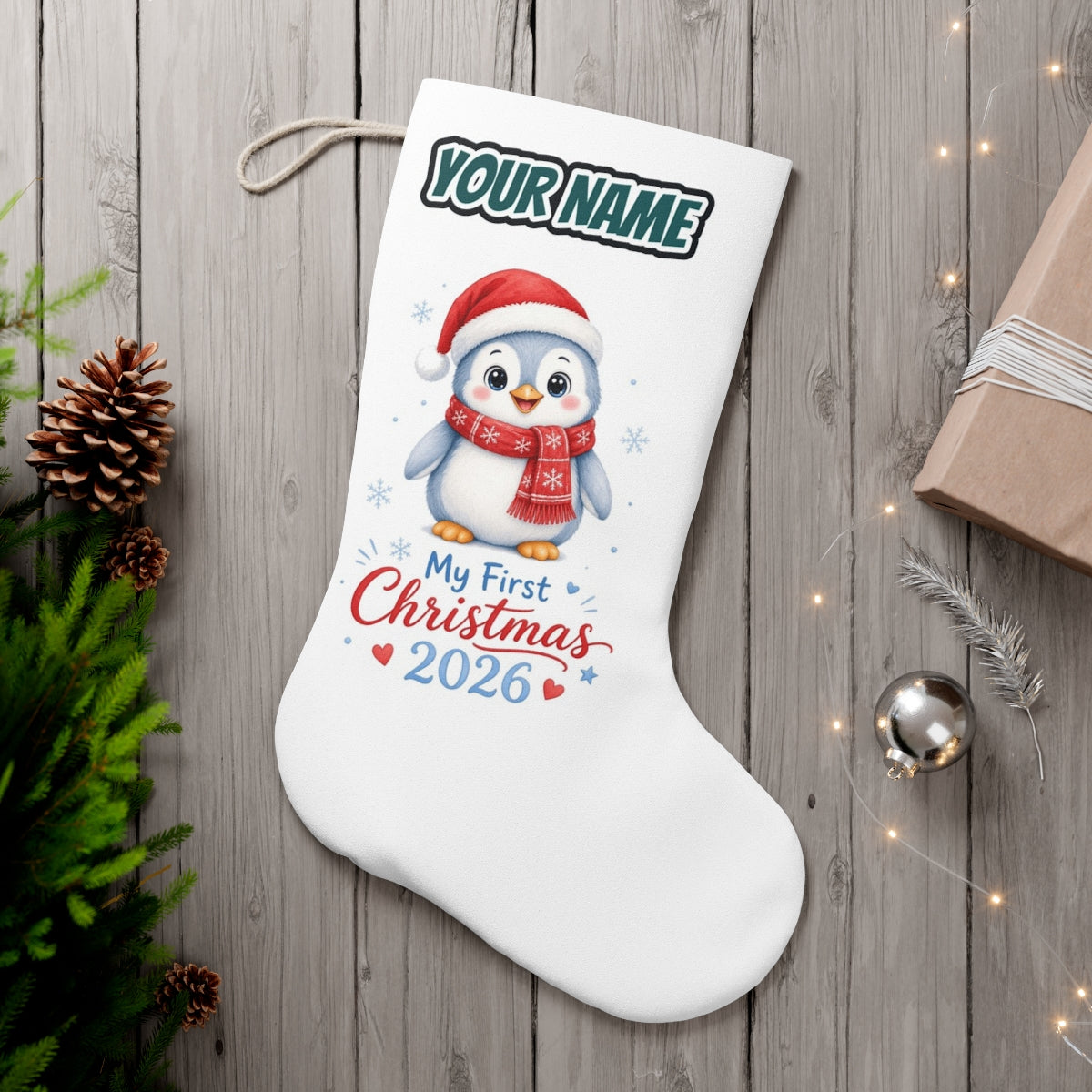 Penguin First Christmas 2026 personalised Christmas stocking, white, with the name across the top
