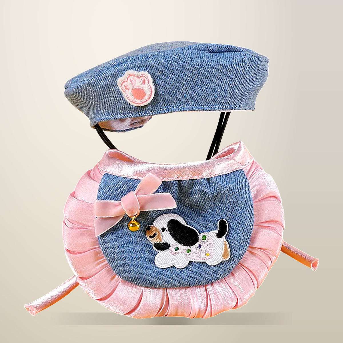 Denim Beret and Bib Pet Clothes Set, on a plain cream background