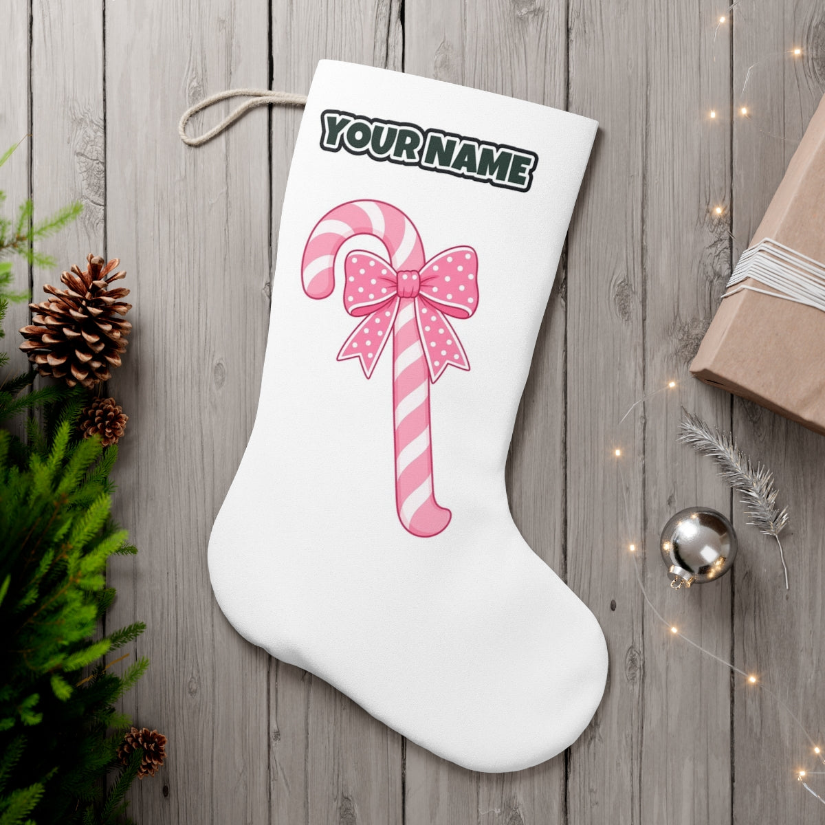Pink Candy Cane Bow personalised Christmas stocking, white, with the name across the top