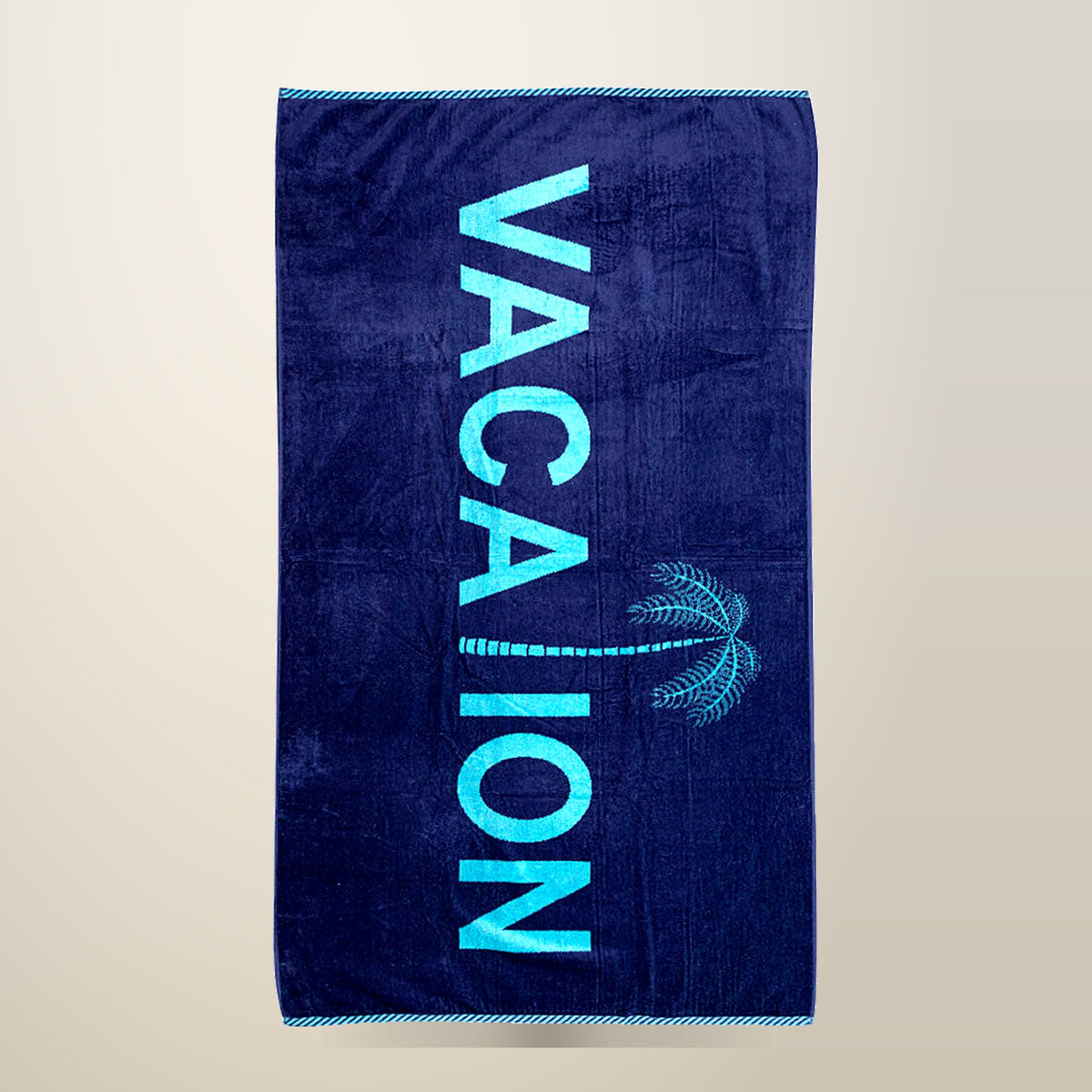 Rans Cotton Jacquard Beach Towel, Vacation, Navy, on a plain cream background
