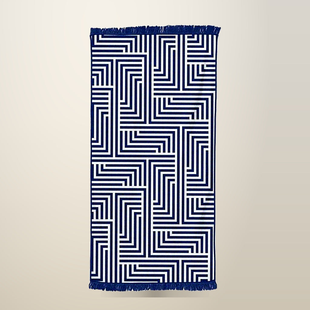 Beach Towel with Tassel, Quick Dry, 150 x 70 cm, on a plain cream background