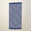 Beach Towel with Tassel, Quick Dry, 150 x 70 cm, on a plain cream background