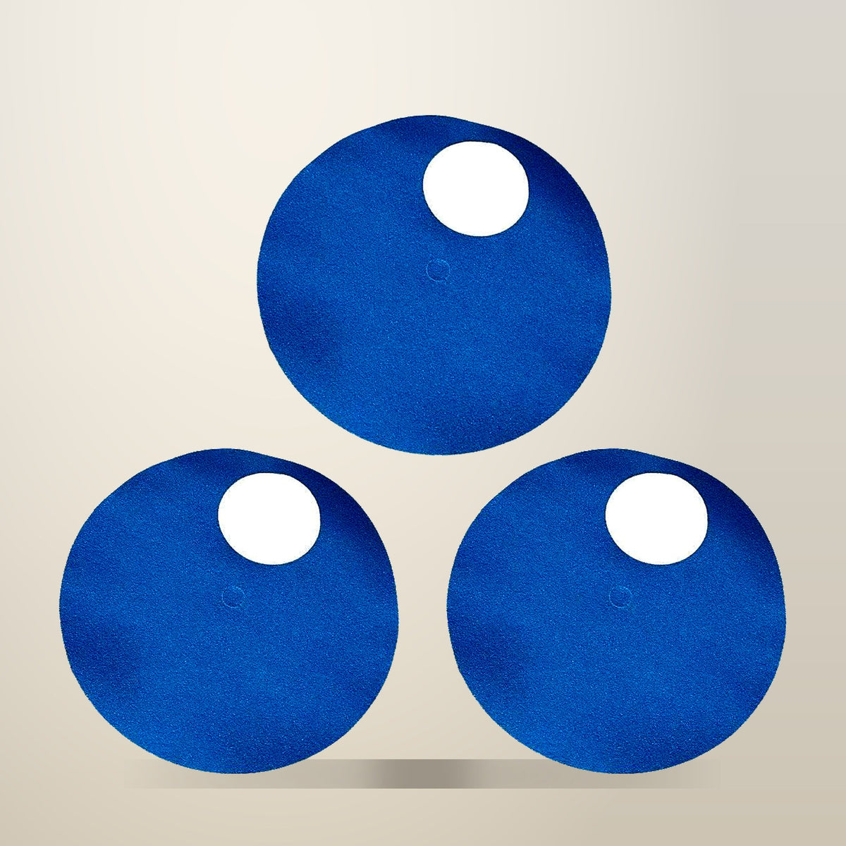 Rotating Nail File and Slow Feeder Toy, Blue and Black, on a plain cream background